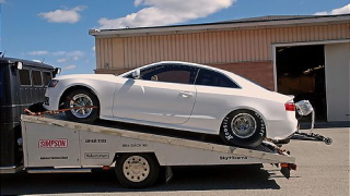 Illustration for article titled Watch an Audi A5 transform into a drag car